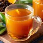 Costa Rican tea with pineapple and mint on rustic table
